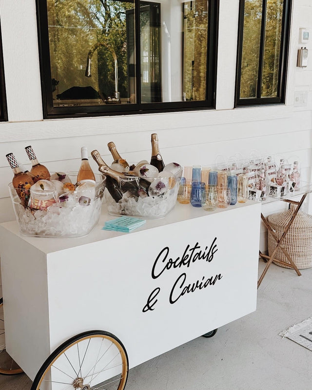 A party cart styled for "Cocktails and Caviar" 